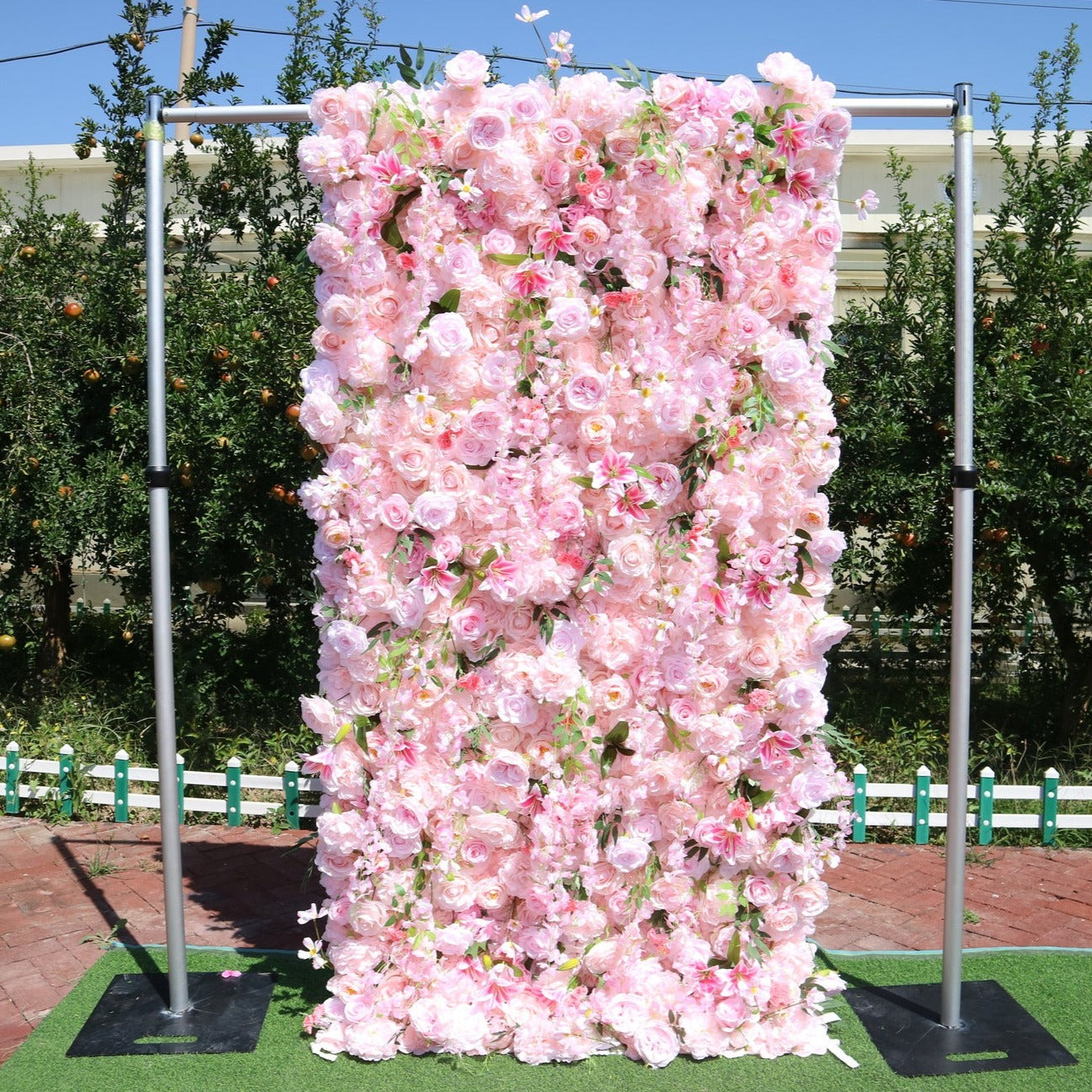 Crafted for realism, the rose pink flower wall boasts a fabric backing and fade-resistant colors.