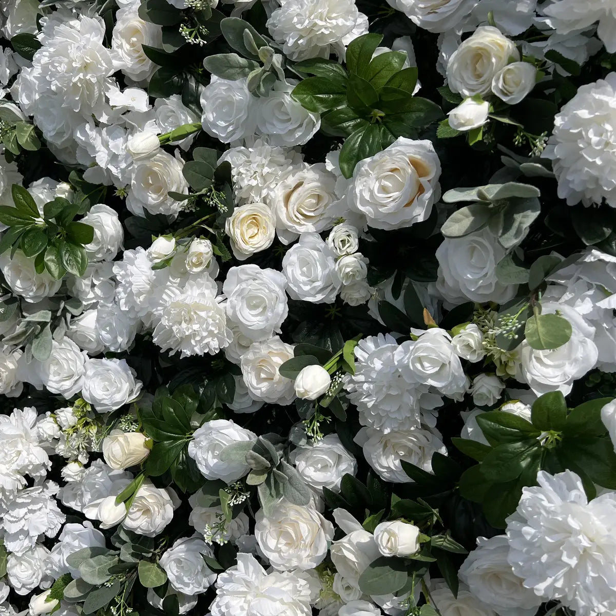White and green flower wall backdrop panel for wedding and event decor.