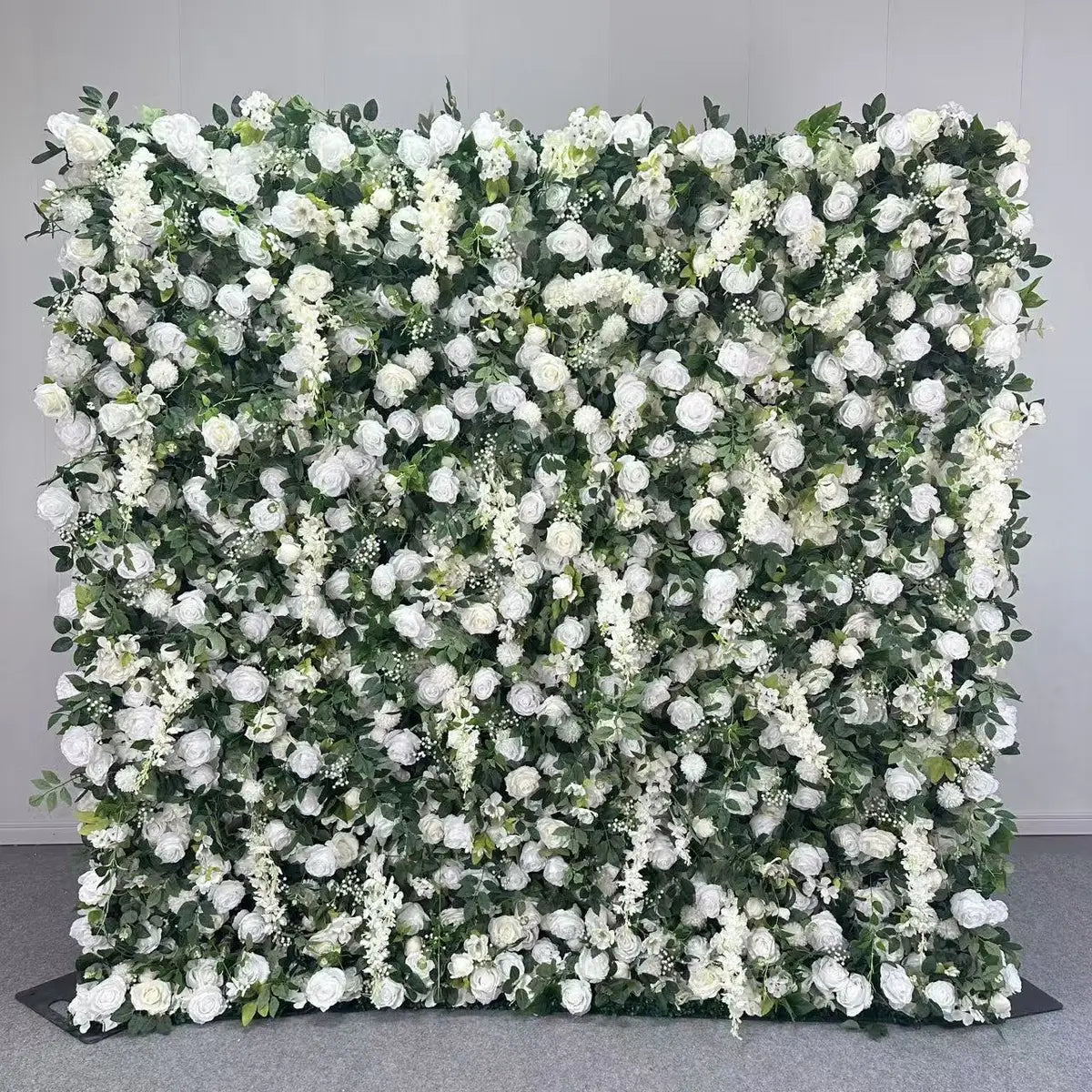 White wedding party flower wall backdrop.