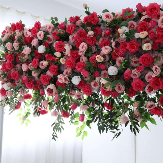 The pink red florals backdrop looks warm and romantic.