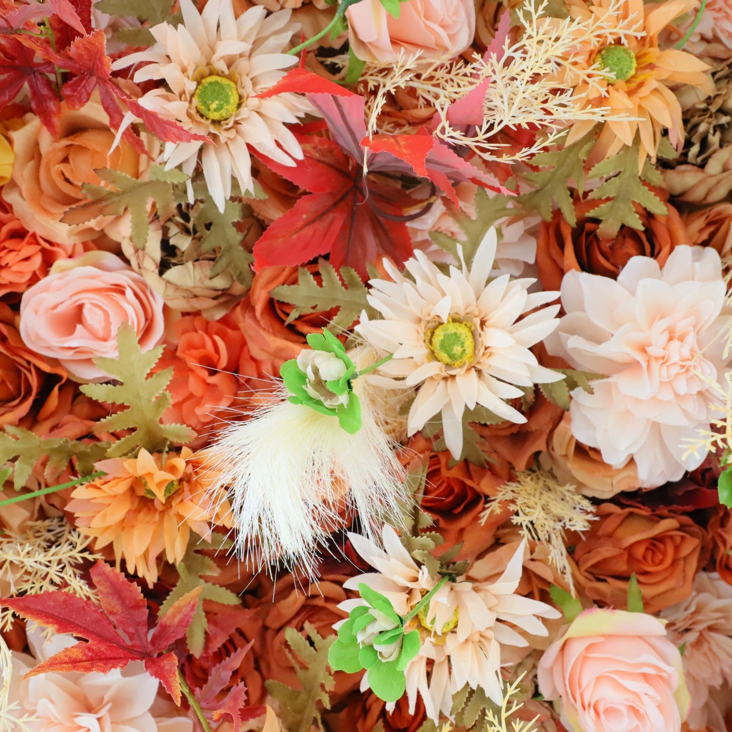The fall orange flower wall's detailed view shows off vivid colors and a realistic fabric backing.