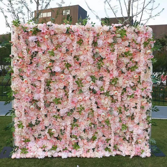 The pink garden fabric flower wall looks sweet and romantic.