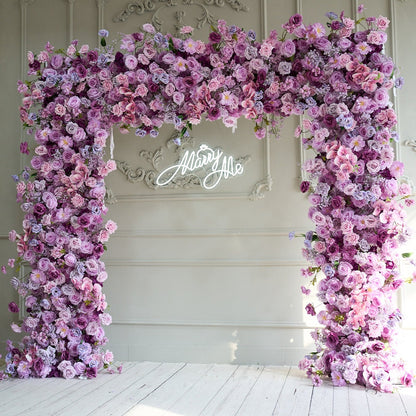 The purple roses florals flower wall looks elegant and romantic.