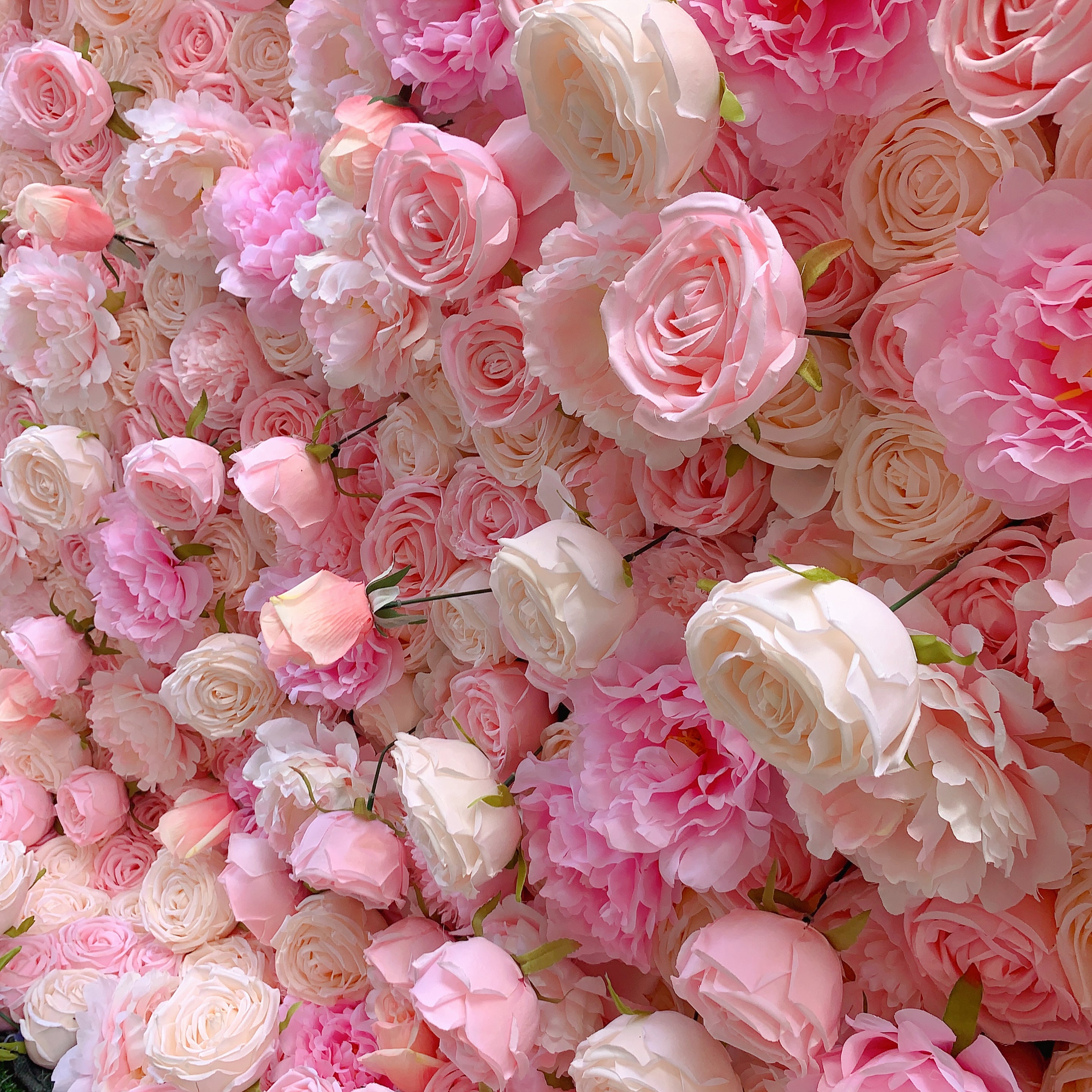 The pink champagne peony fabric flower wall is vivid and lifelike.