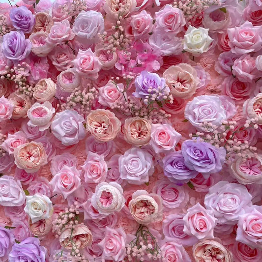 Elegant pink rose flower wall backdrop for romantic wedding ceremony.