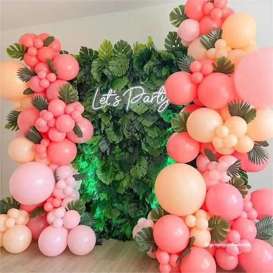 Crafted for realism, the green tropical leaves flower wall boasts a fabric backing and fade-resistant colors.