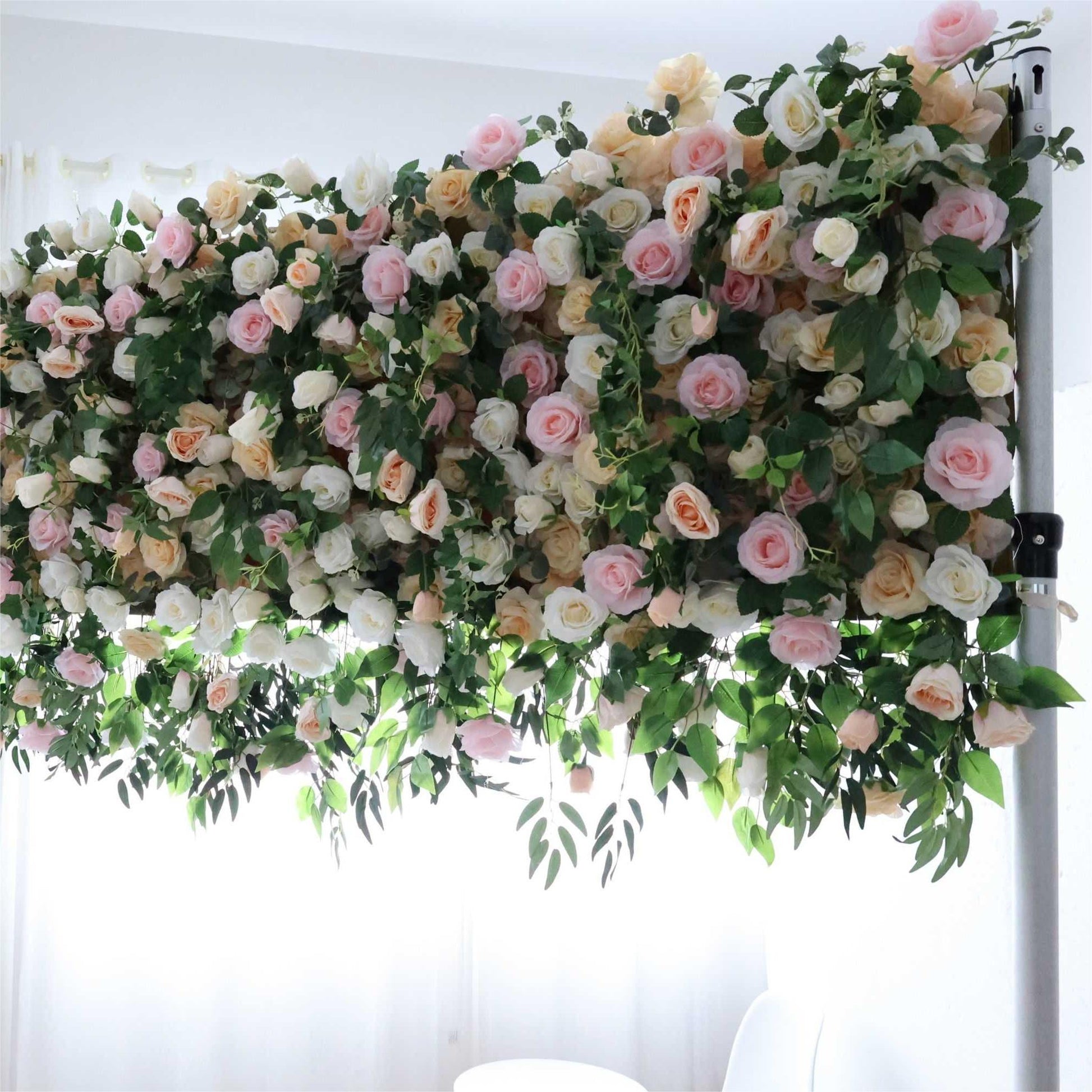 The green pink florals backdrop is full of atmosphere.