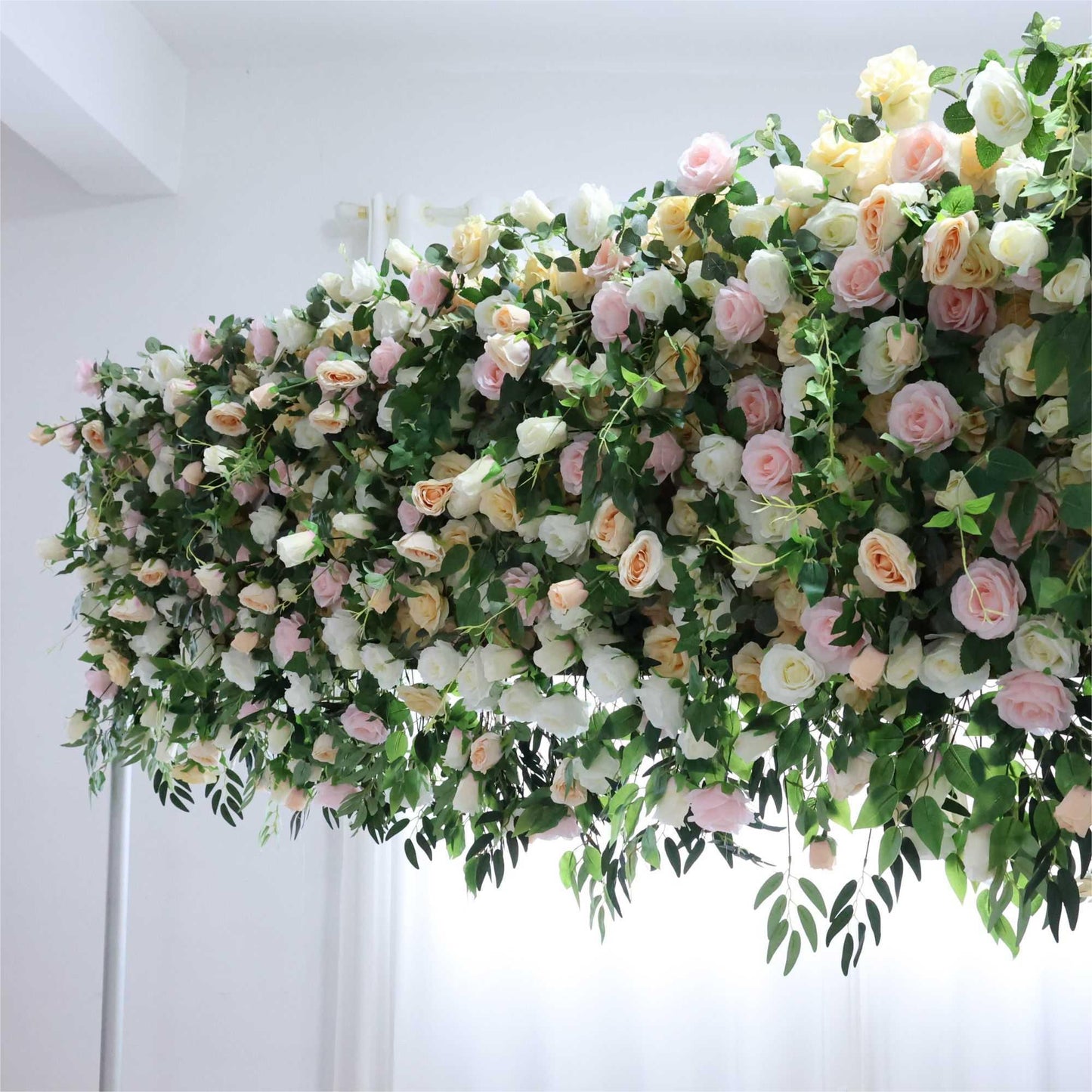 The green pink florals backdrop is full of atmosphere.