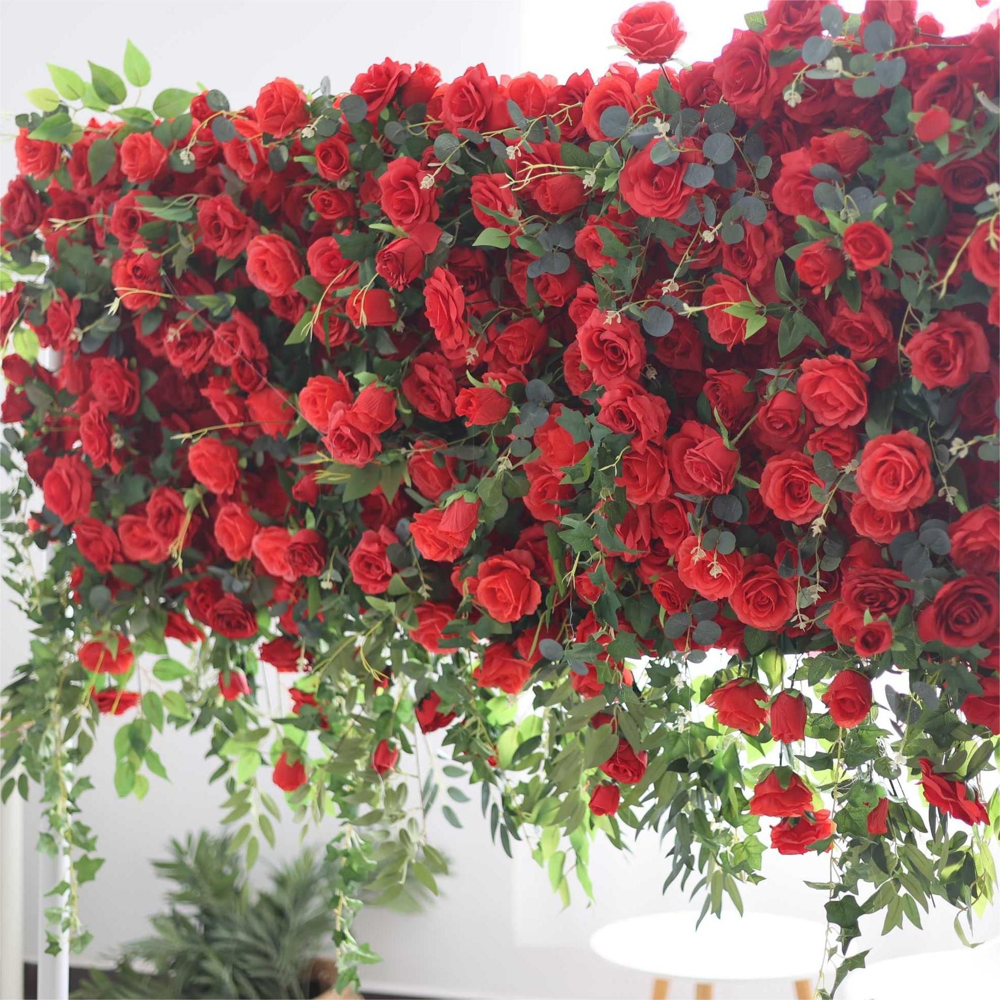 The red rose flower wall looks warm and romantic.