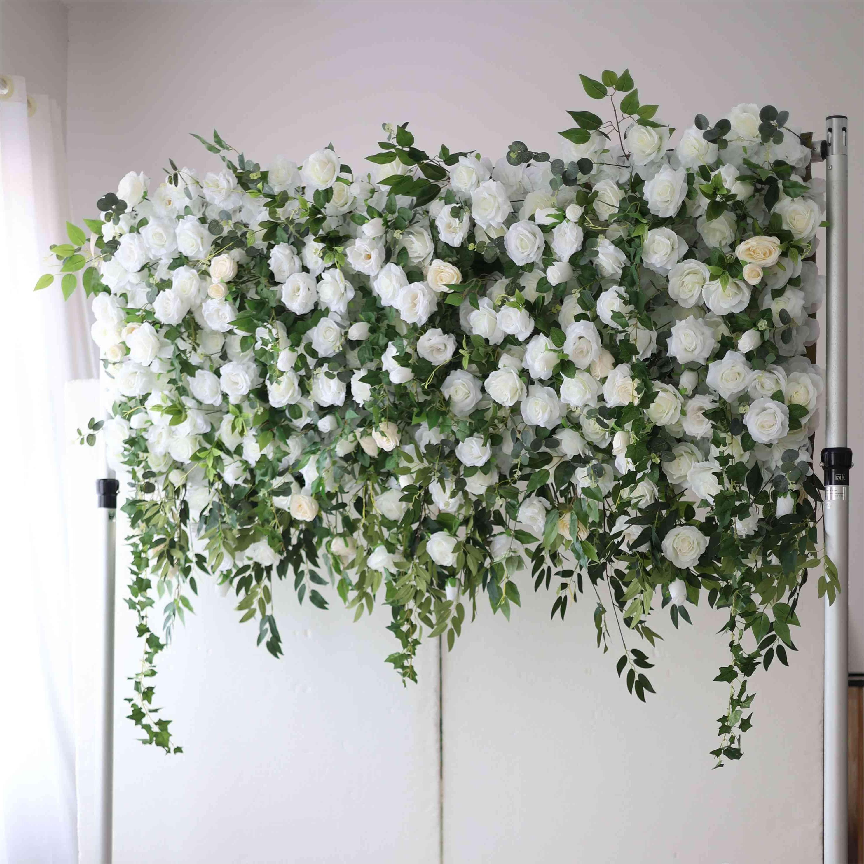 The white green florals flower wall looks noble and elegant.