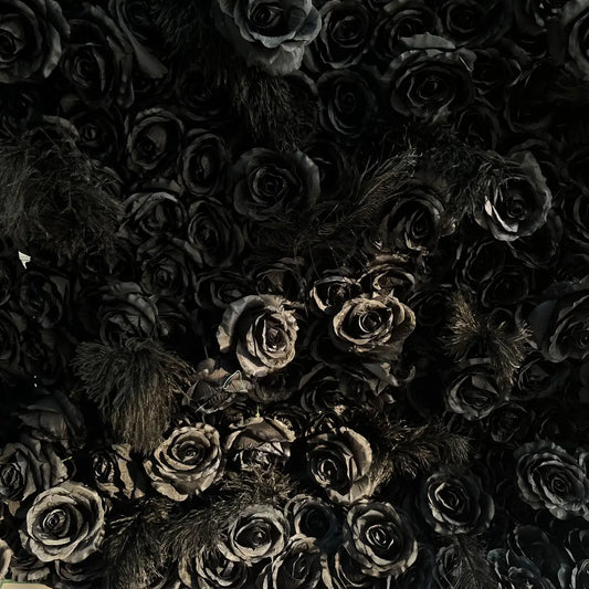 The black flower wall detailed view highlights its vibrant, realistic shapes and fabric backing.