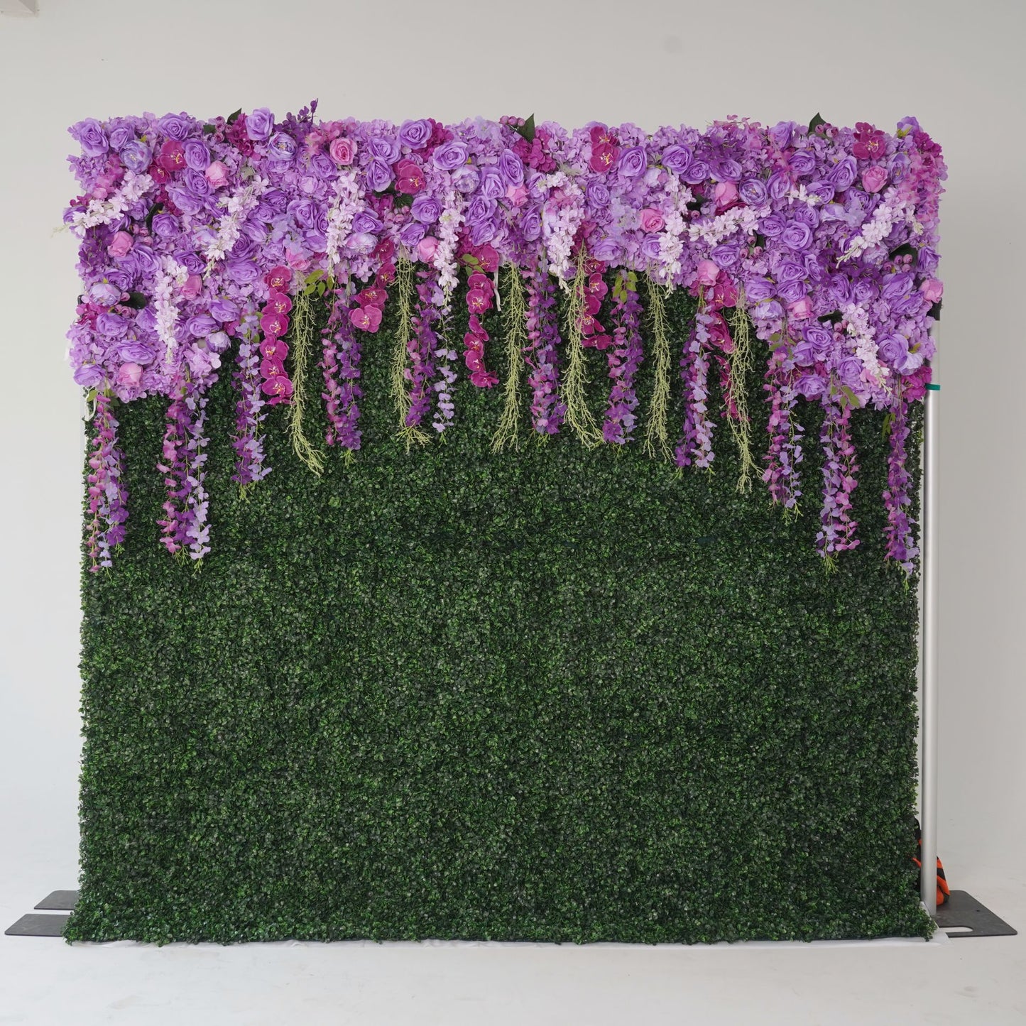 Crafted for realism, purple flower wall boasts a fabric backing and fade-resistant colors.