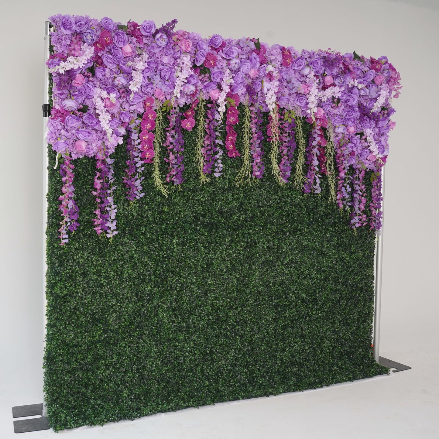 The purple flower wall's side view boasts realistic shapes and a fabric backing