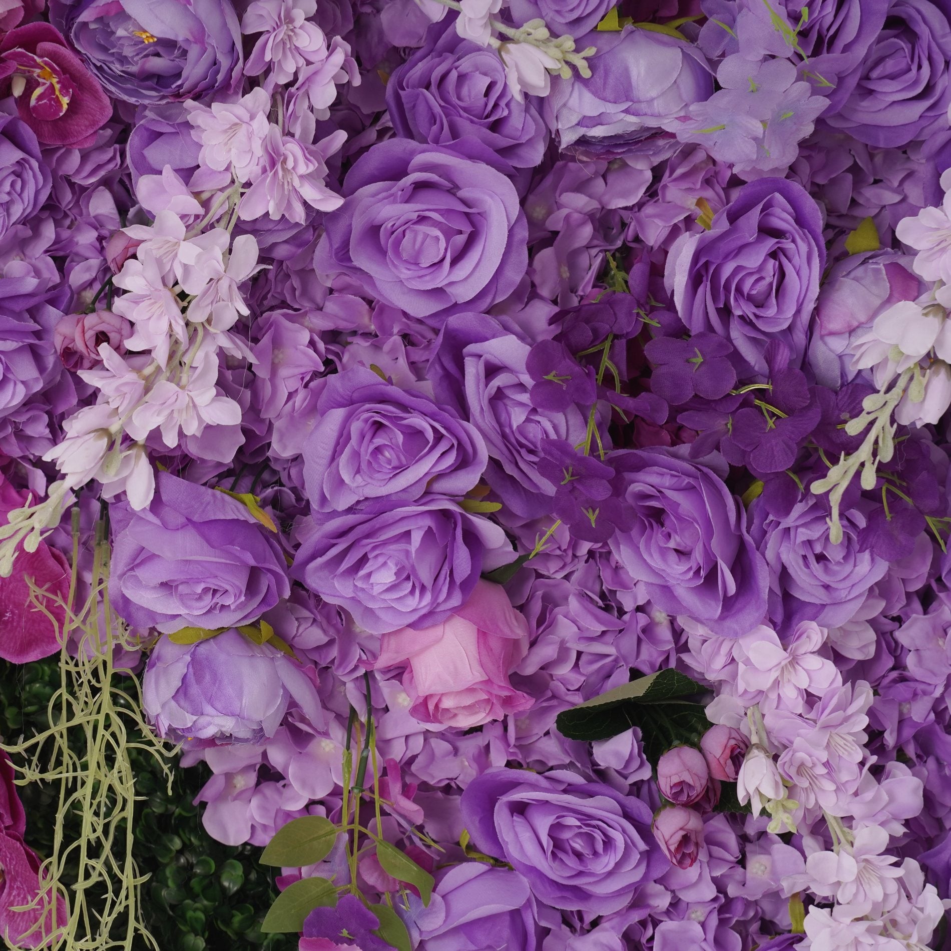 The purple flower wall's detailed view shows off vivid colors and a realistic fabric backing.