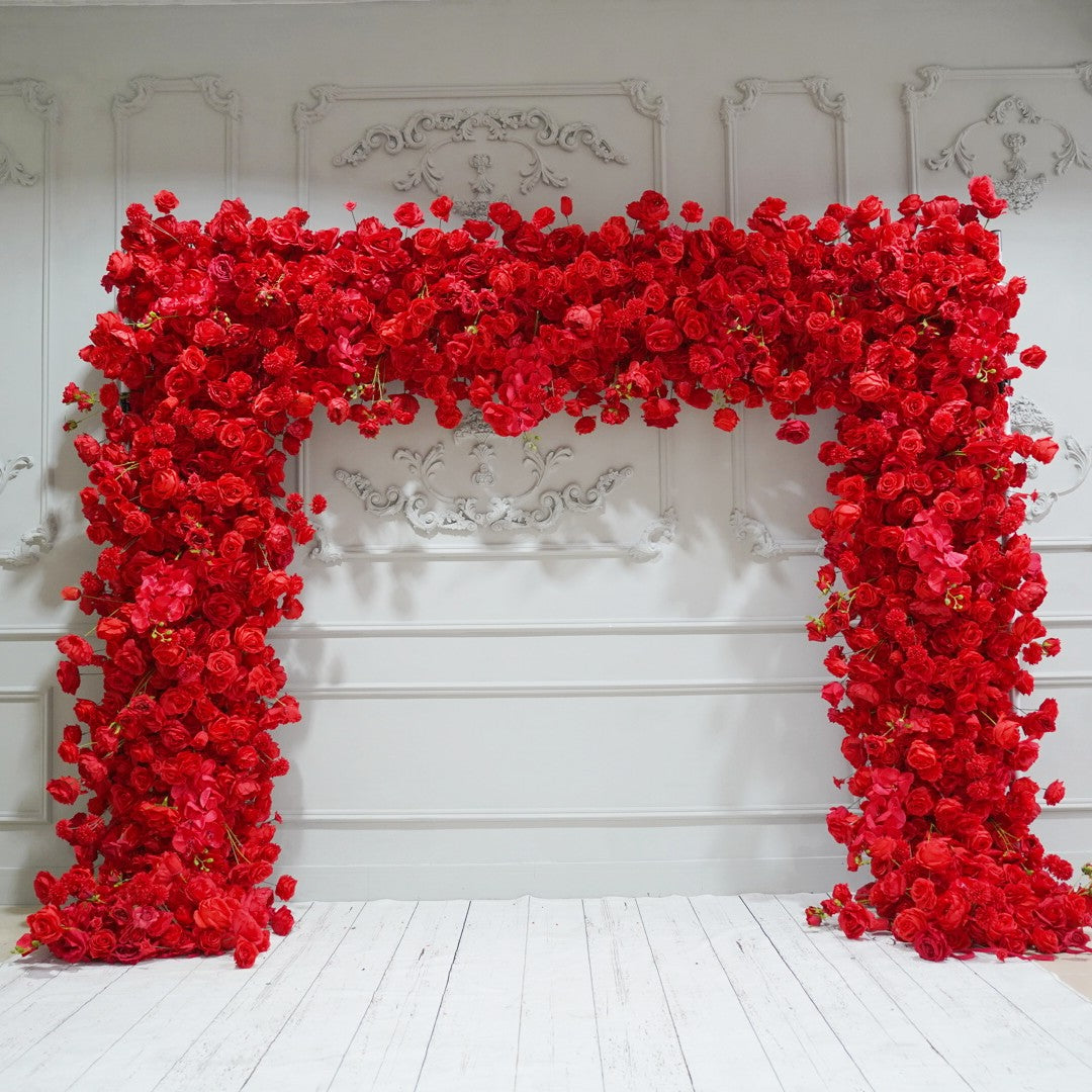 The red roses flower wall looks warm and romantic.