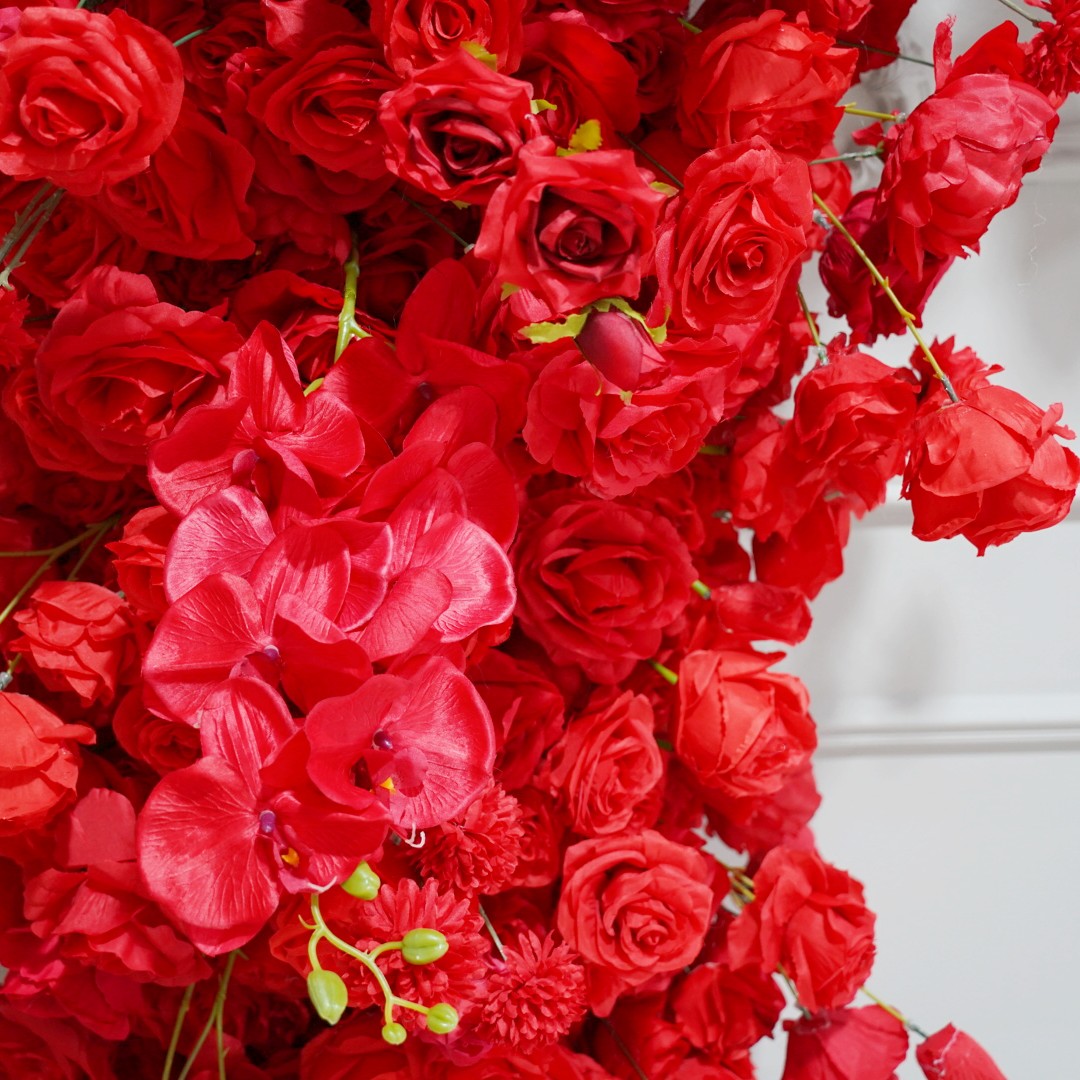 The red roses flower wall looks vivid and realistic.