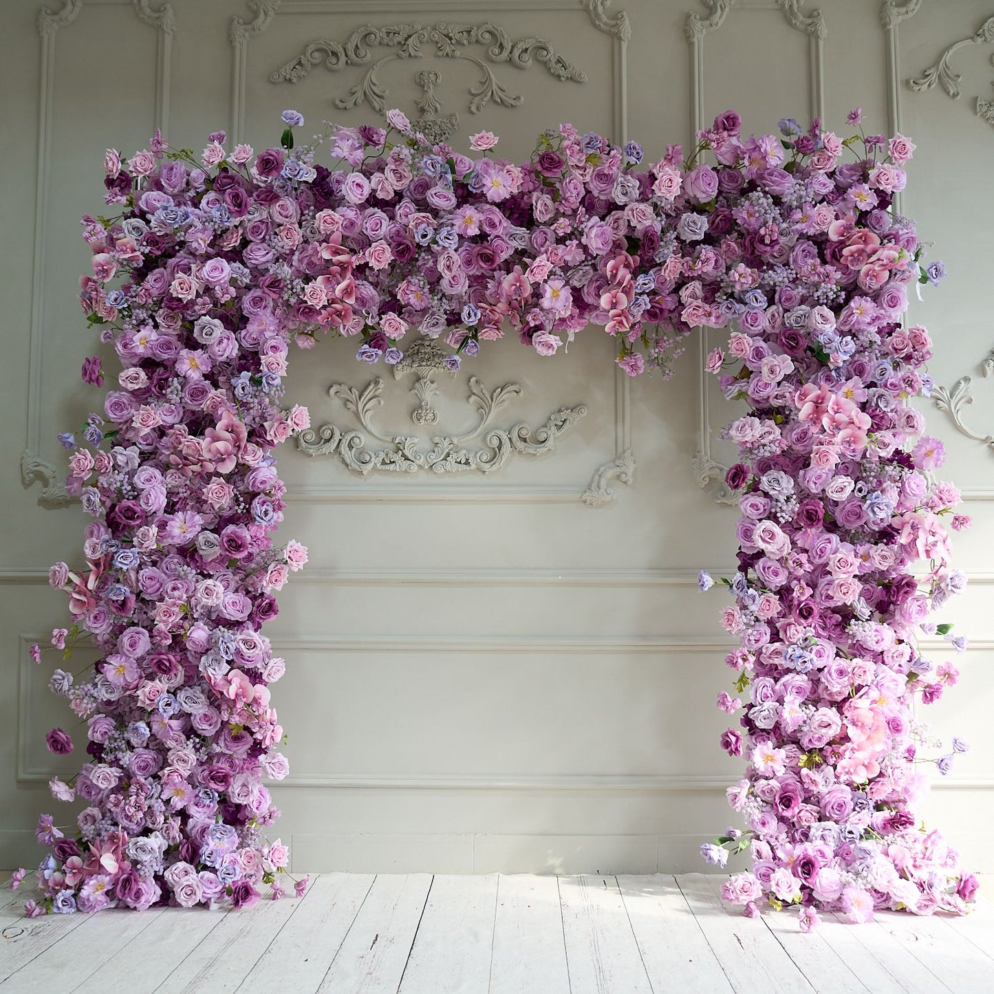 The purple roses florals flower wall looks elegant and romantic.