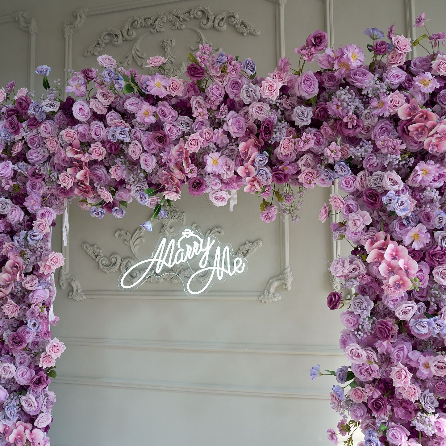 The purple roses florals flower wall looks elegant and romantic.
