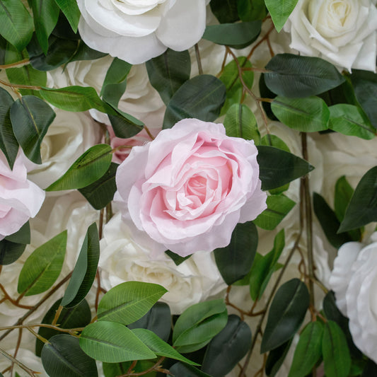 The green pink flower wall's detailed view highlights its vibrant, realistic shapes and fabric backing.