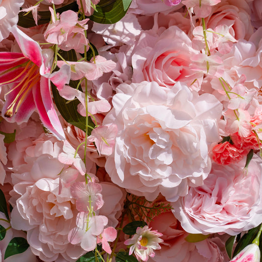 The rose pink flower wall's detailed view highlights its vibrant, realistic shapes and fabric backing.