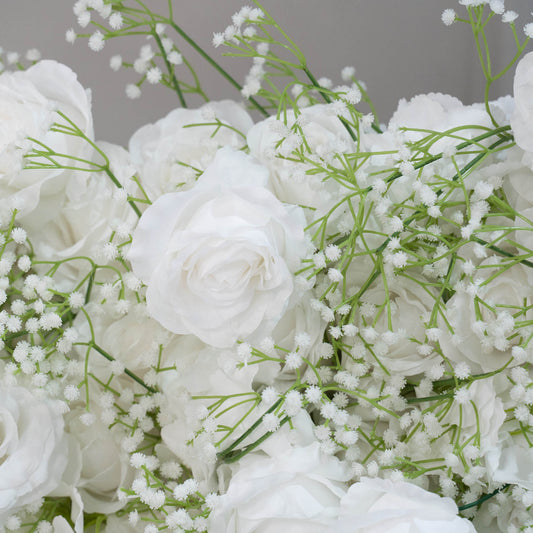 Vibrant colors give the baby's breath and white rose flower wall detailed realism and beauty.