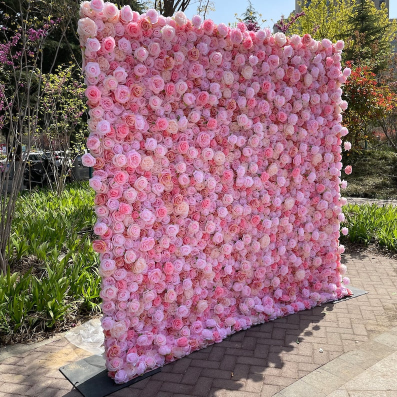 The pink rose fabric flower wall presents a romantic atmosphere.